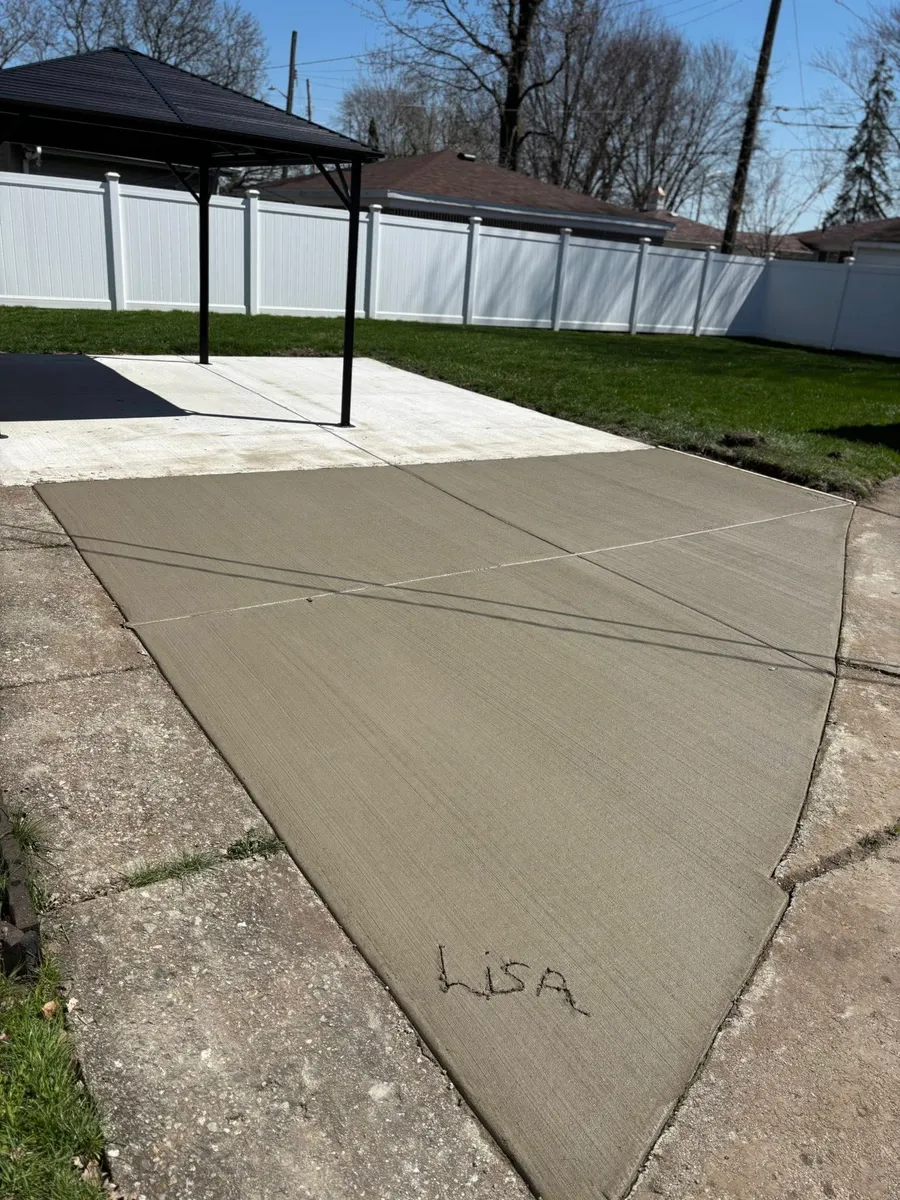 Concrete patio extension (photo 2 of 2)